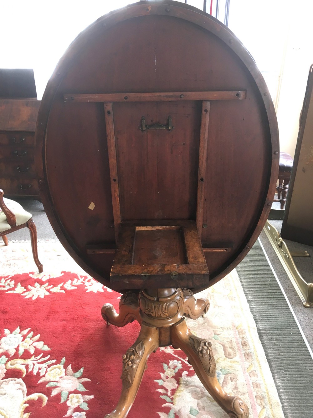 Victorian Burr Walnut Tilt-Top Dining/Centre Table on Carved Pedestal with Floral Decoration. View V