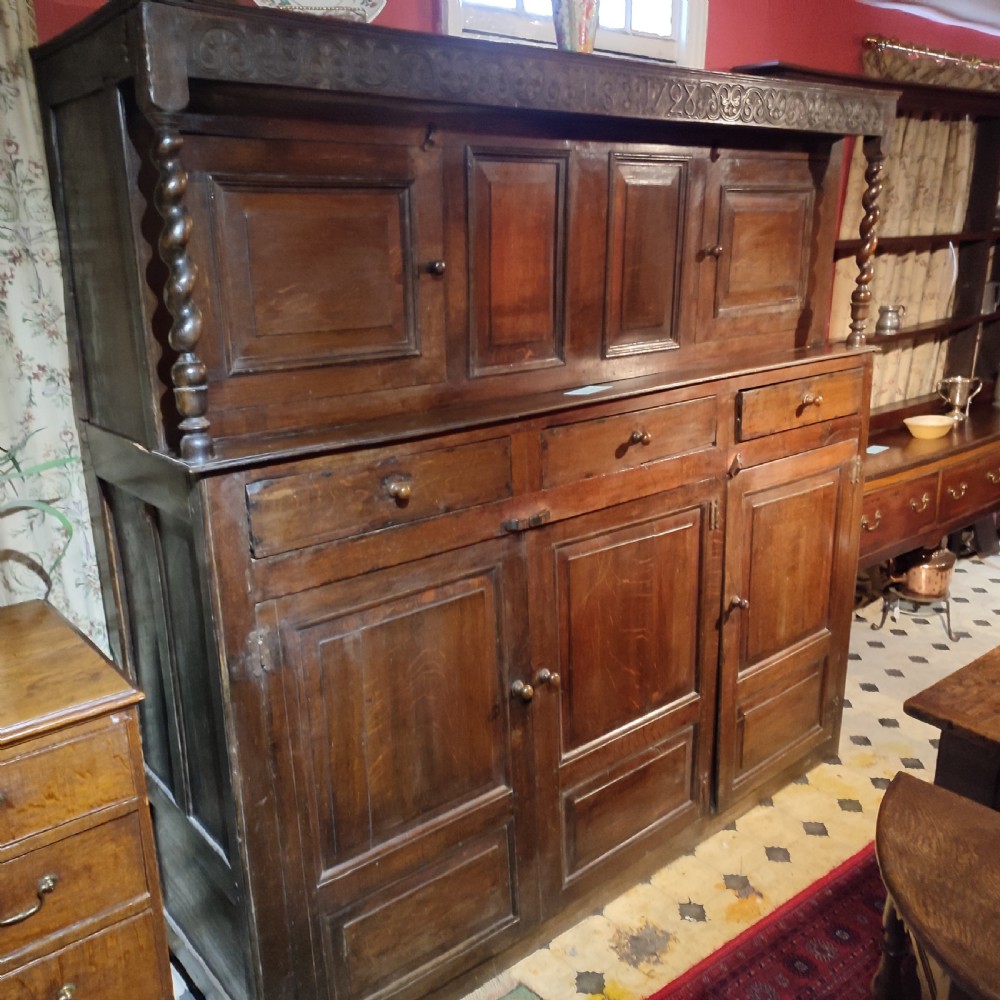 18thC Oak Court Cupboard Bearing Date 1728 to Carved Frieze View IV
