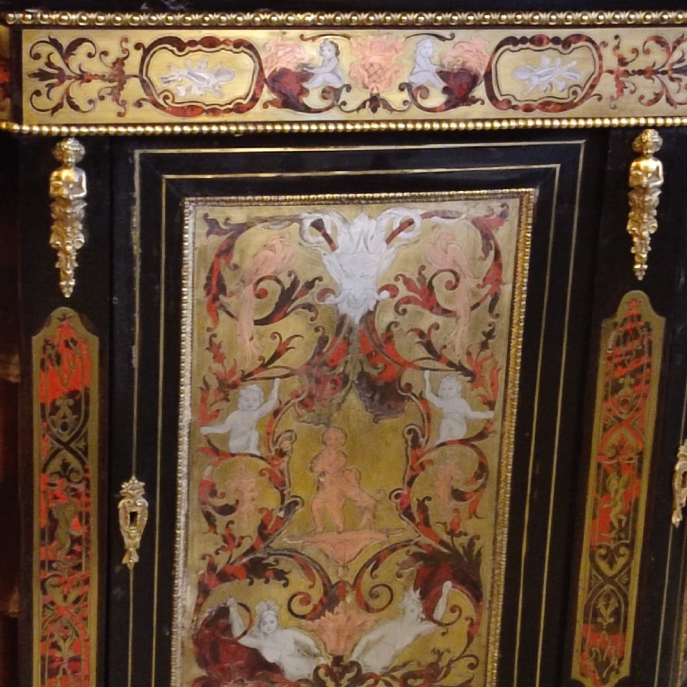 An ebonised 19th-century credenza featuring intricate brass and tortoiseshell Boulle marquetry, central panel with scrollwork, curved glazed side doors, and gilt bronze mounts. View II