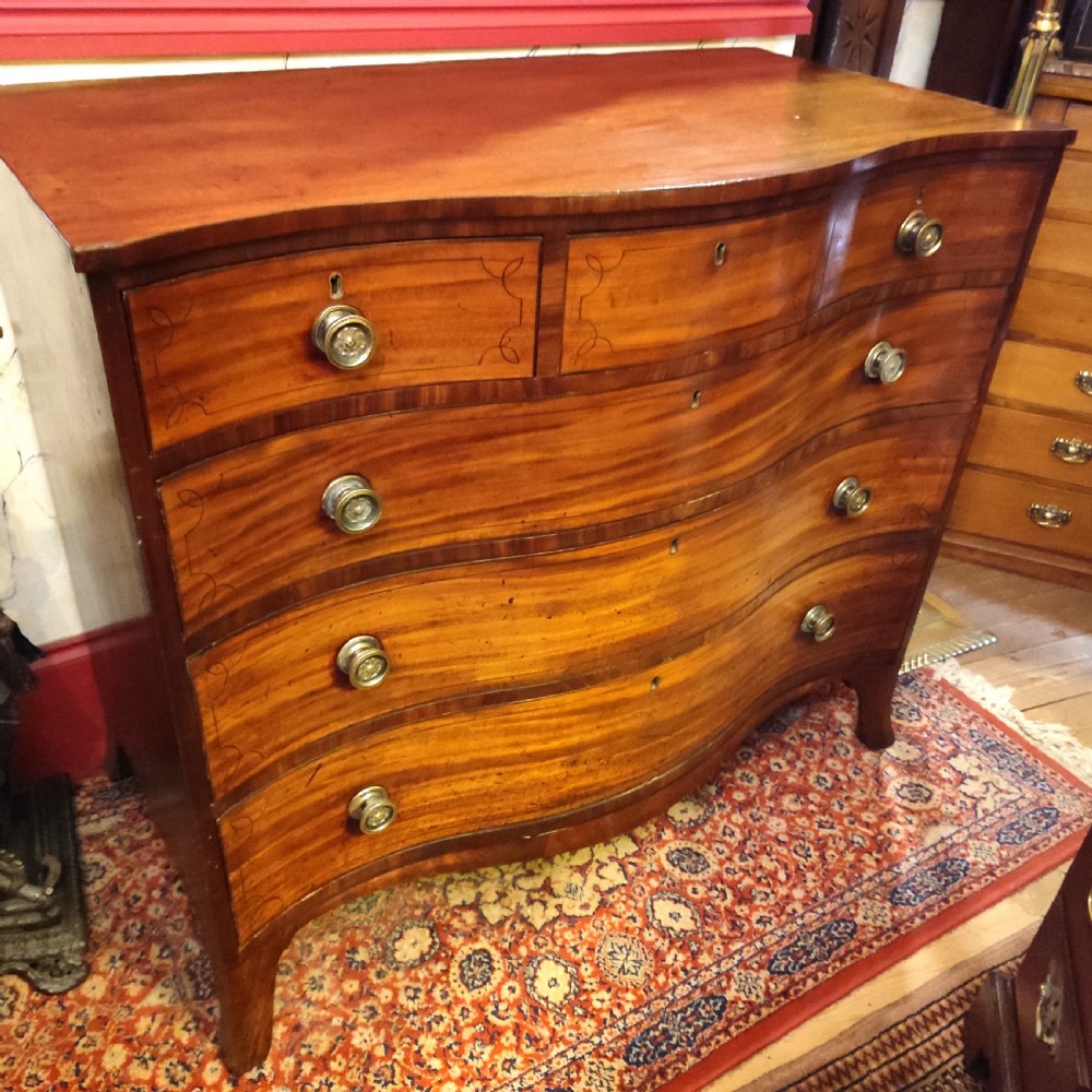 Regency Period Serpentine Mahogany Chest View II