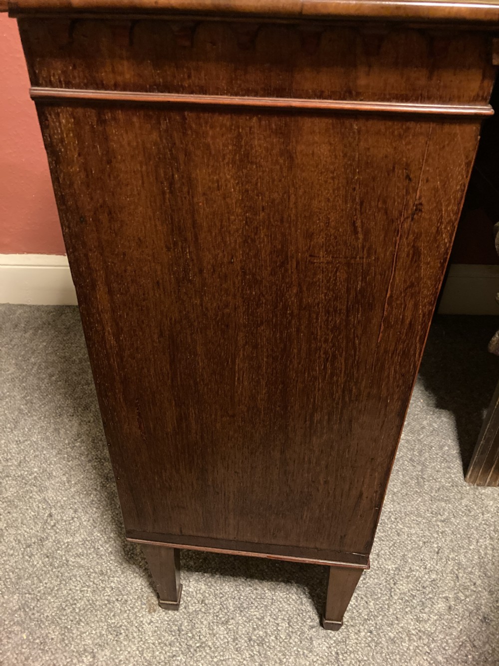 A Regency mahogany side cabinet featuring an upper gallery shelf on turned supports, two drawers, oval-inlaid cupboard doors, and tapered square legs. View IV