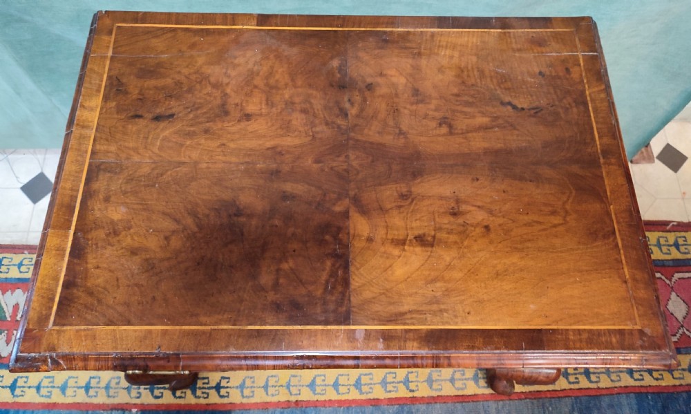 An 18th-century George III walnut lowboy table featuring three inlaid drawers, brass handles, a shaped apron, and four cabriole legs. View III