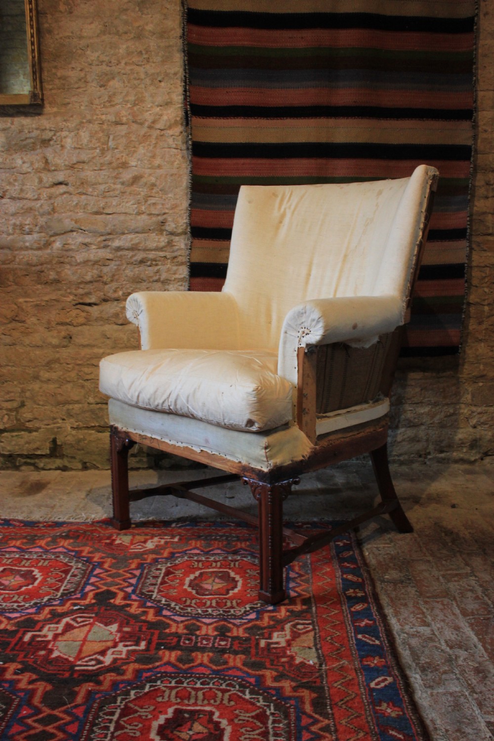 A deep seated Federal barrel back armchair