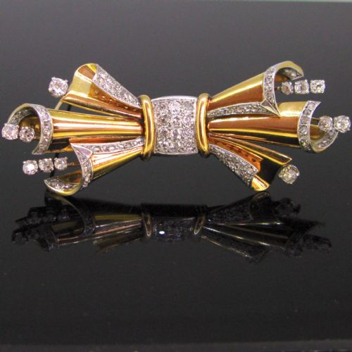 Retro Diamond Bow Ribbon Brooch, 18kt Yellow Gold and Platinum, Circa 1940