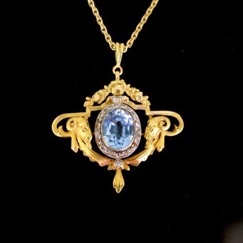 Antique Art Nouveau Rams Head Synthetic Blue Spinel & Diamonds Pendant, 18kt Yellow Gold and Platinum, France, Circa 1905