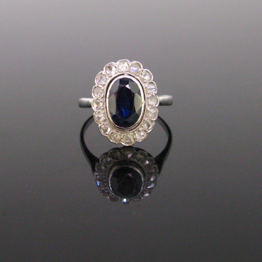 Sapphire and Rose cut Diamonds Cluster Ring, 18kt white gold and platinum, circa 1925