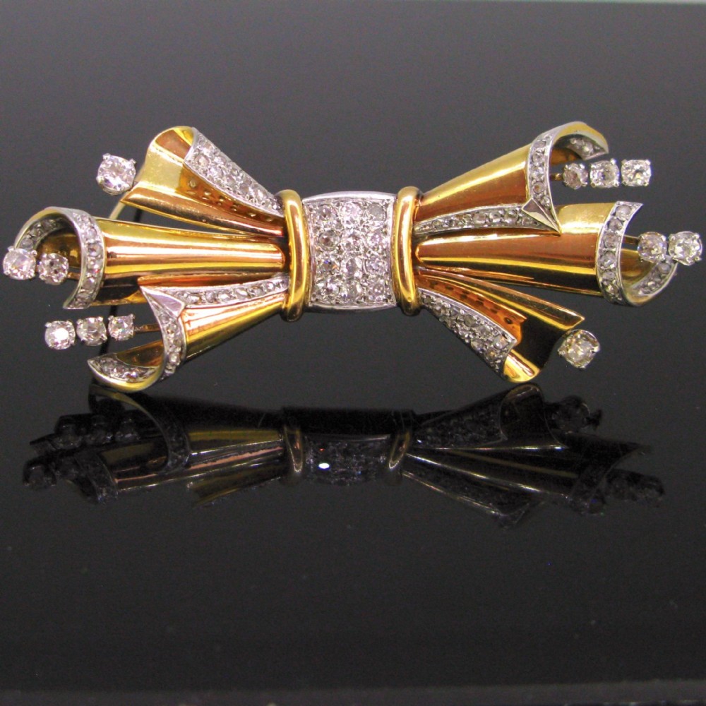 Retro Diamond Bow Ribbon Brooch, 18kt Yellow Gold and Platinum, circa 1940