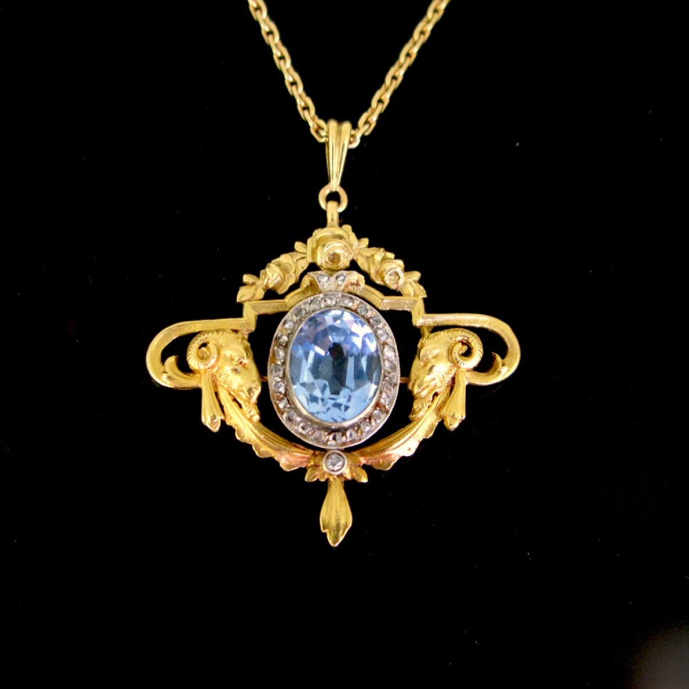 Antique Art Nouveau Rams Head Synthetic Blue Spinel & Diamonds Pendant, 18kt yellow gold and platinum, France, circa 1905