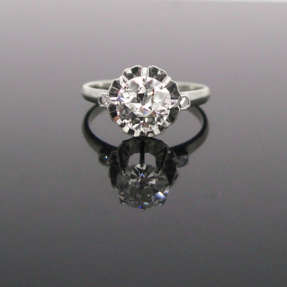 French Art Deco 1.25ct Solitaire Diamond Ring, 18kt gold and platinum