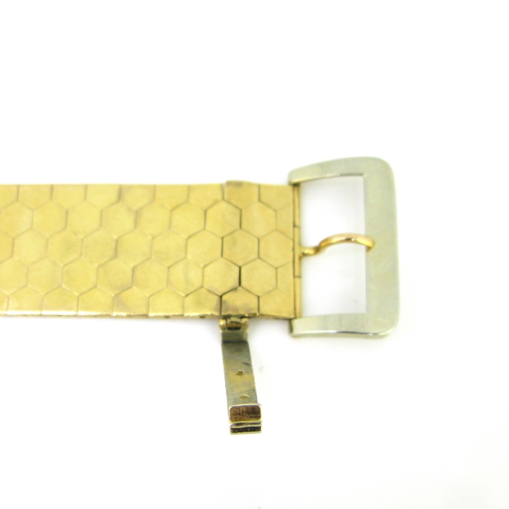 Retro Two Tones Gold Belt Buckle Bracelet, 18kt yellow and white gold, France, circa 1940
 View V