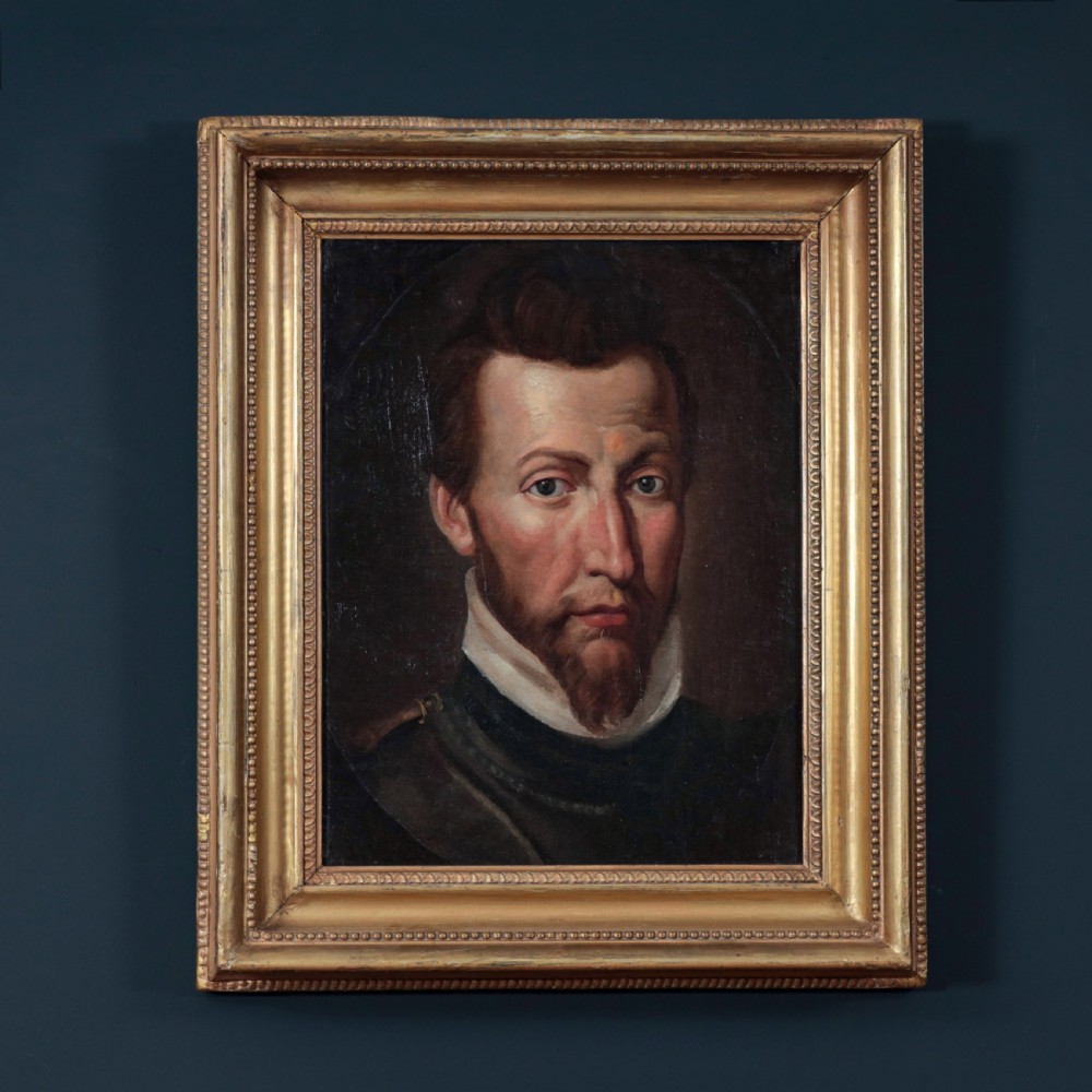 An oil portrait of a bearded gentleman wearing a high white collar and dark doublet, presented in a gilded wooden picture frame. View II