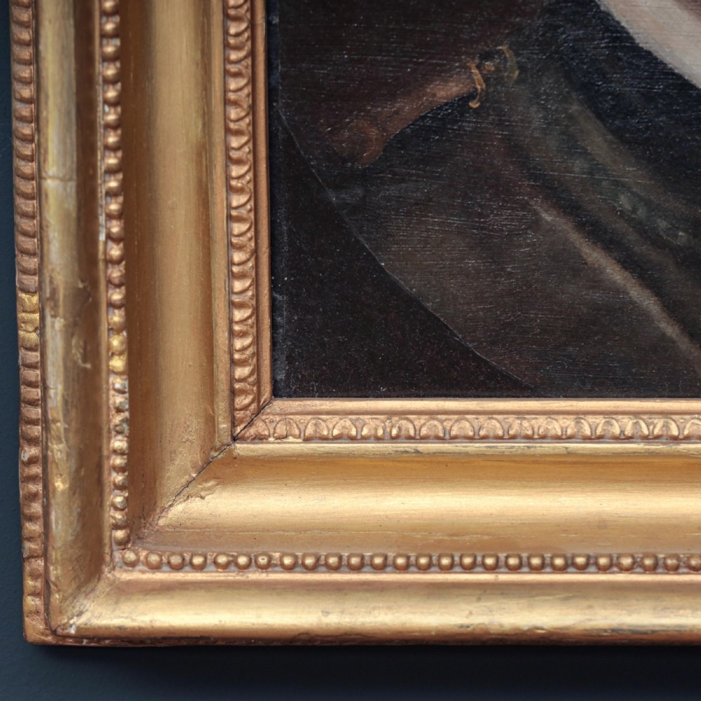 An oil portrait of a bearded gentleman wearing a high white collar and dark doublet, presented in a gilded wooden picture frame. View III