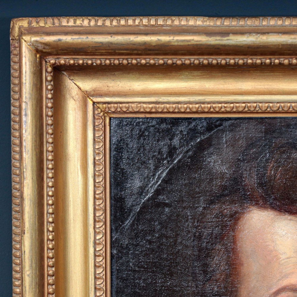An oil portrait of a bearded gentleman wearing a high white collar and dark doublet, presented in a gilded wooden picture frame. View VI