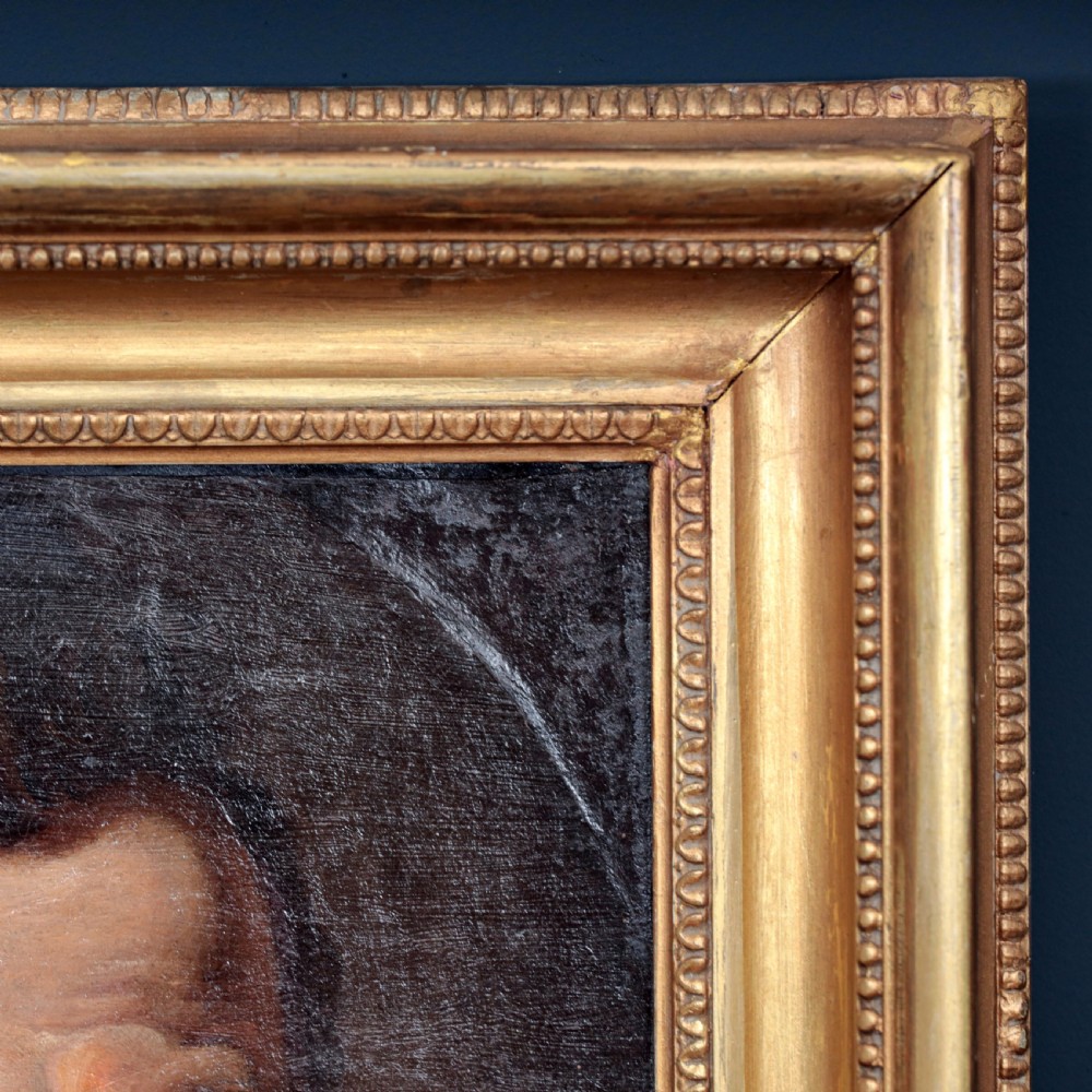 An oil portrait of a bearded gentleman wearing a high white collar and dark doublet, presented in a gilded wooden picture frame. View VII