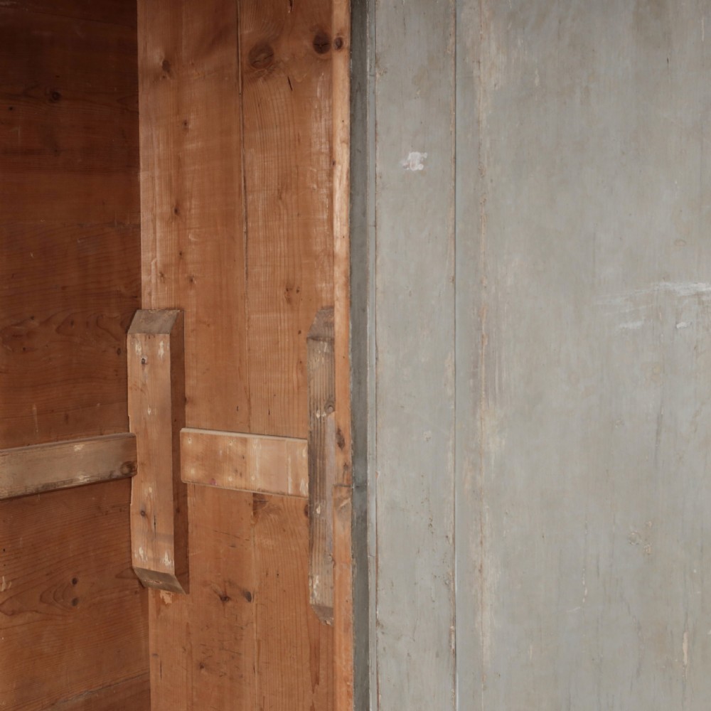 A nineteenth-century Italian painted timber cupboard featuring double doors with raised diamond panel mouldings and a muted grey finish. View VIII