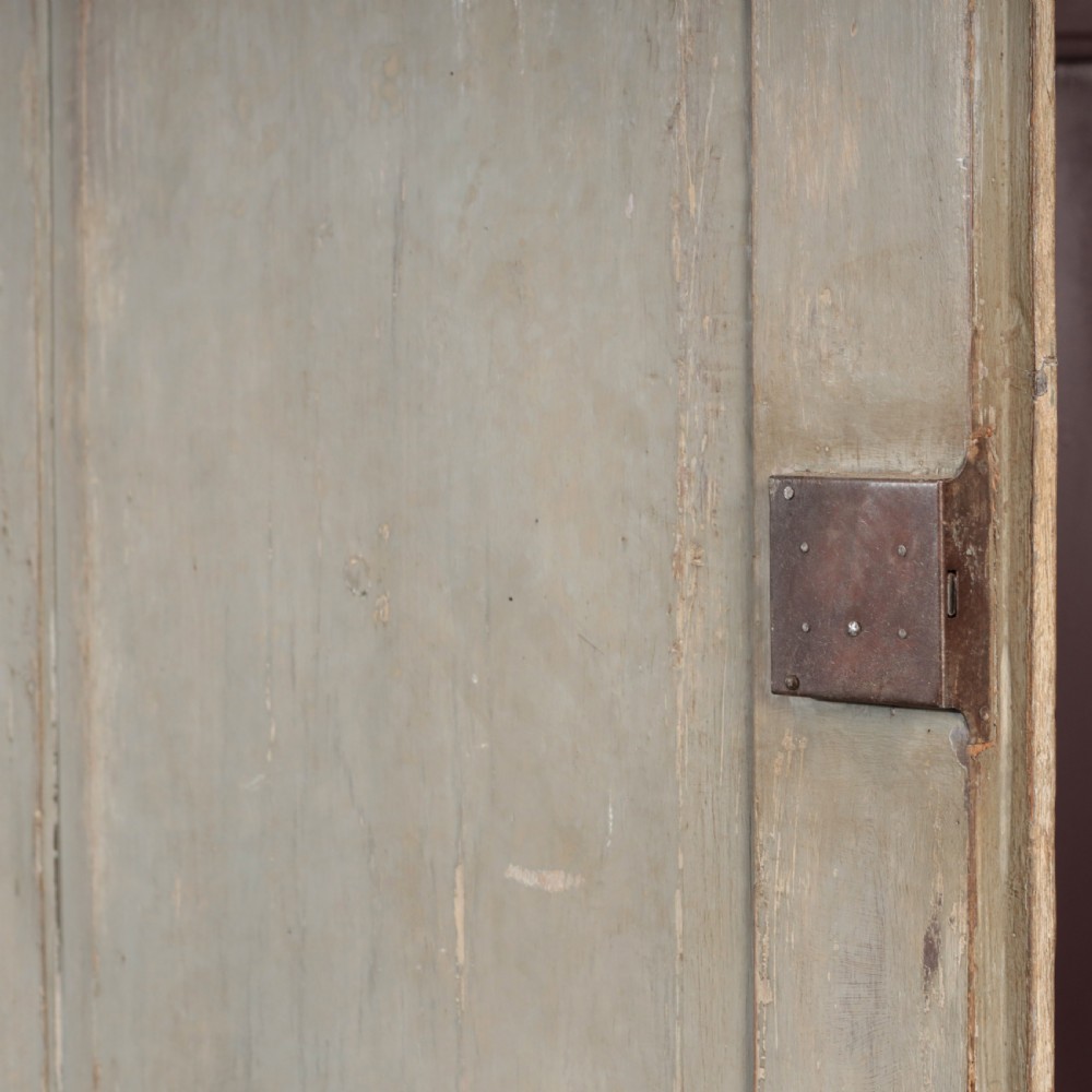 A nineteenth-century Italian painted timber cupboard featuring double doors with raised diamond panel mouldings and a muted grey finish. View IX