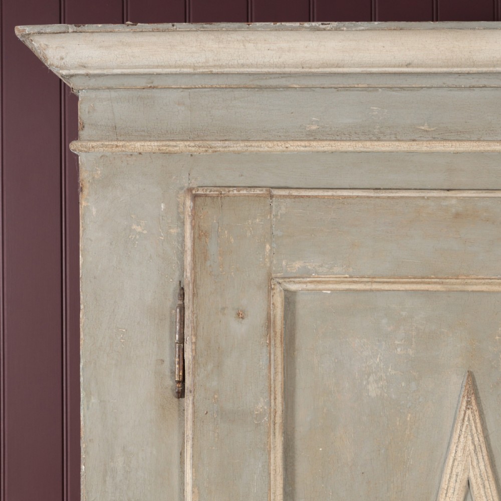 A nineteenth-century Italian painted timber cupboard featuring double doors with raised diamond panel mouldings and a muted grey finish. View XII