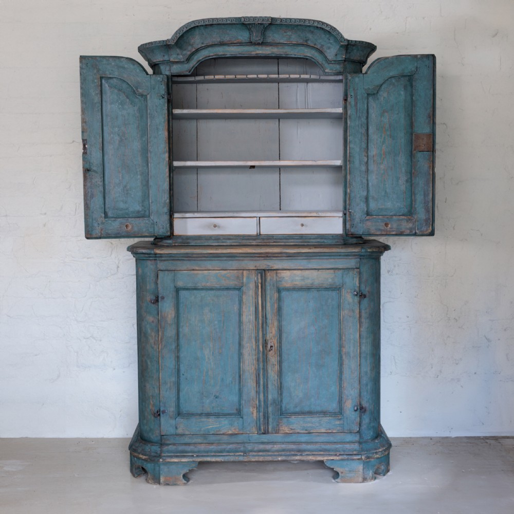 An eighteenth-century French buffet a deux corps with a distressed blue painted finish, arched upper cabinet doors, and iron hardware. View VII
