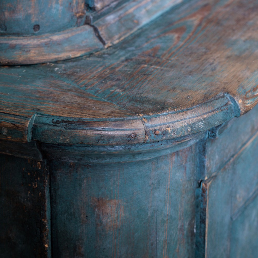 An eighteenth-century French buffet a deux corps with a distressed blue painted finish, arched upper cabinet doors, and iron hardware. View XXVIII