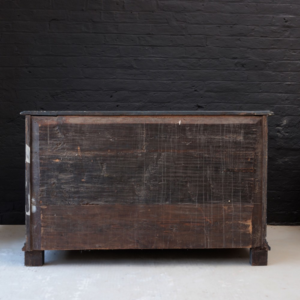 An 18th-century dark green painted serpentine-front chest featuring three drawers and detailed brass keyhole escutcheons. View II