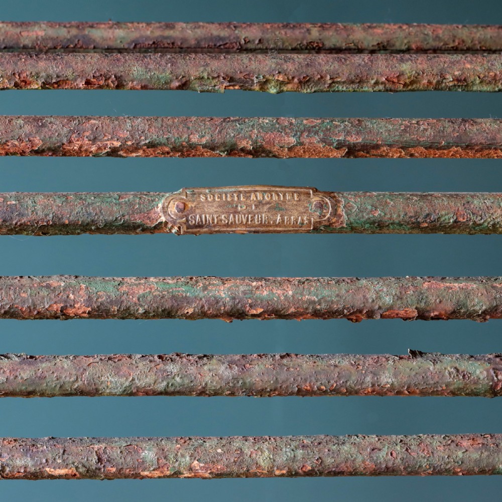 A nineteenth-century French Arras garden bench made of curved green tubular iron slats resting on a riveted iron frame. View VII