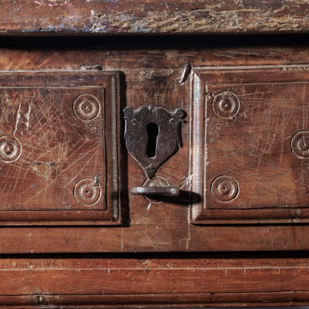 An 18th-century Spanish wooden console table featuring two carved drawer fronts with iron handles and a thick timber top. View IX