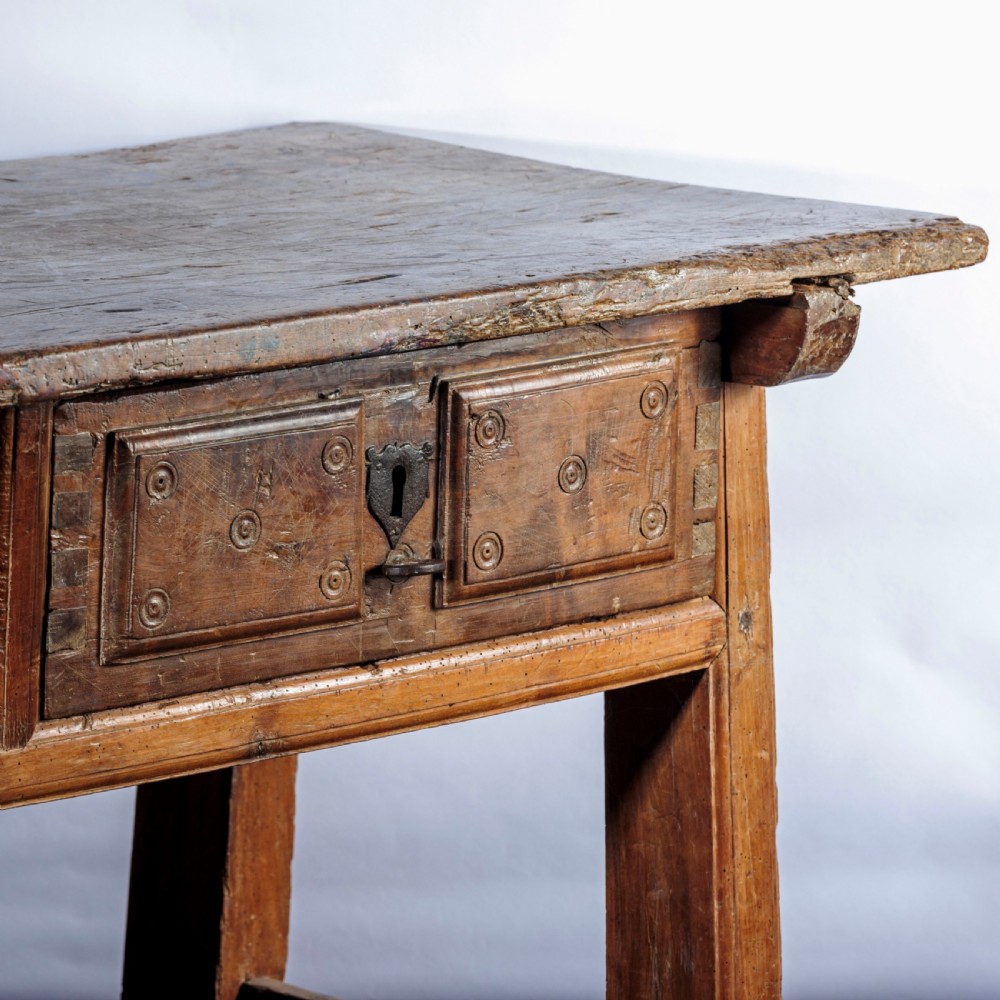 An 18th-century Spanish wooden console table featuring two carved drawer fronts with iron handles and a thick timber top. View XIII