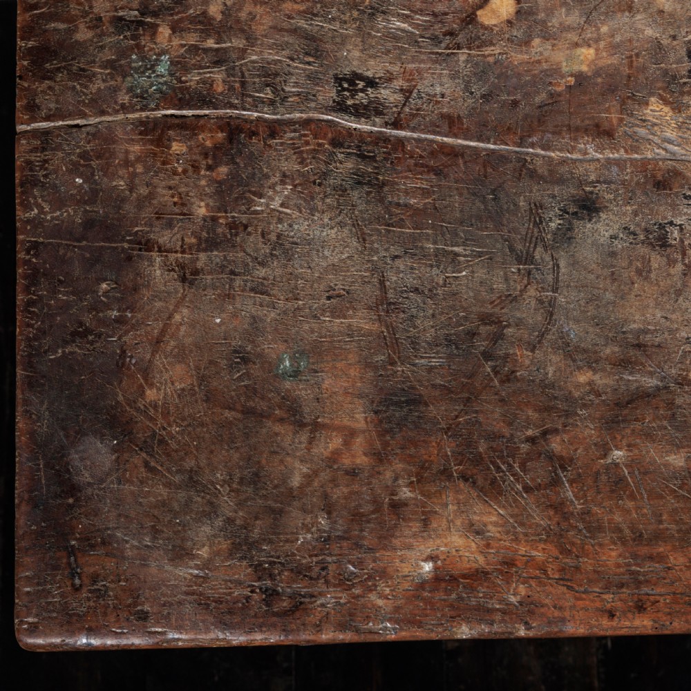 An 18th-century Spanish wooden console table featuring two carved drawer fronts with iron handles and a thick timber top. View XIX