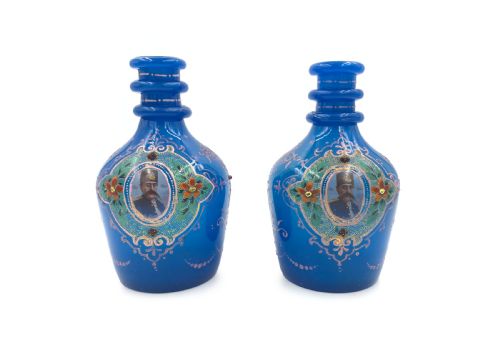a pair of royal blue opaque jewelled and enamelled bohemian glass hookah bases with portraits of sultan mozaffar aldin shah qajar dated 1315 hijri - CATEGORY: ANTIQUE GLASS - DATED 19TH CENTURY