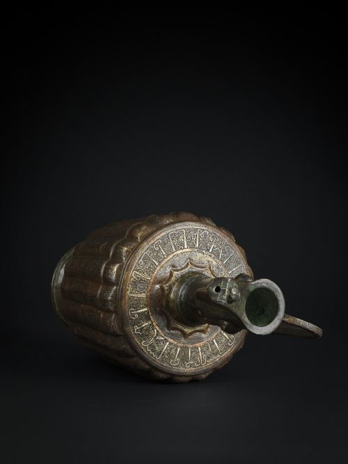 A KHORASAN SILVER AND COPPER INLAID BRONZE EWER PERSIA 12TH CENTURY - ADDITIONAL PHOTO 1