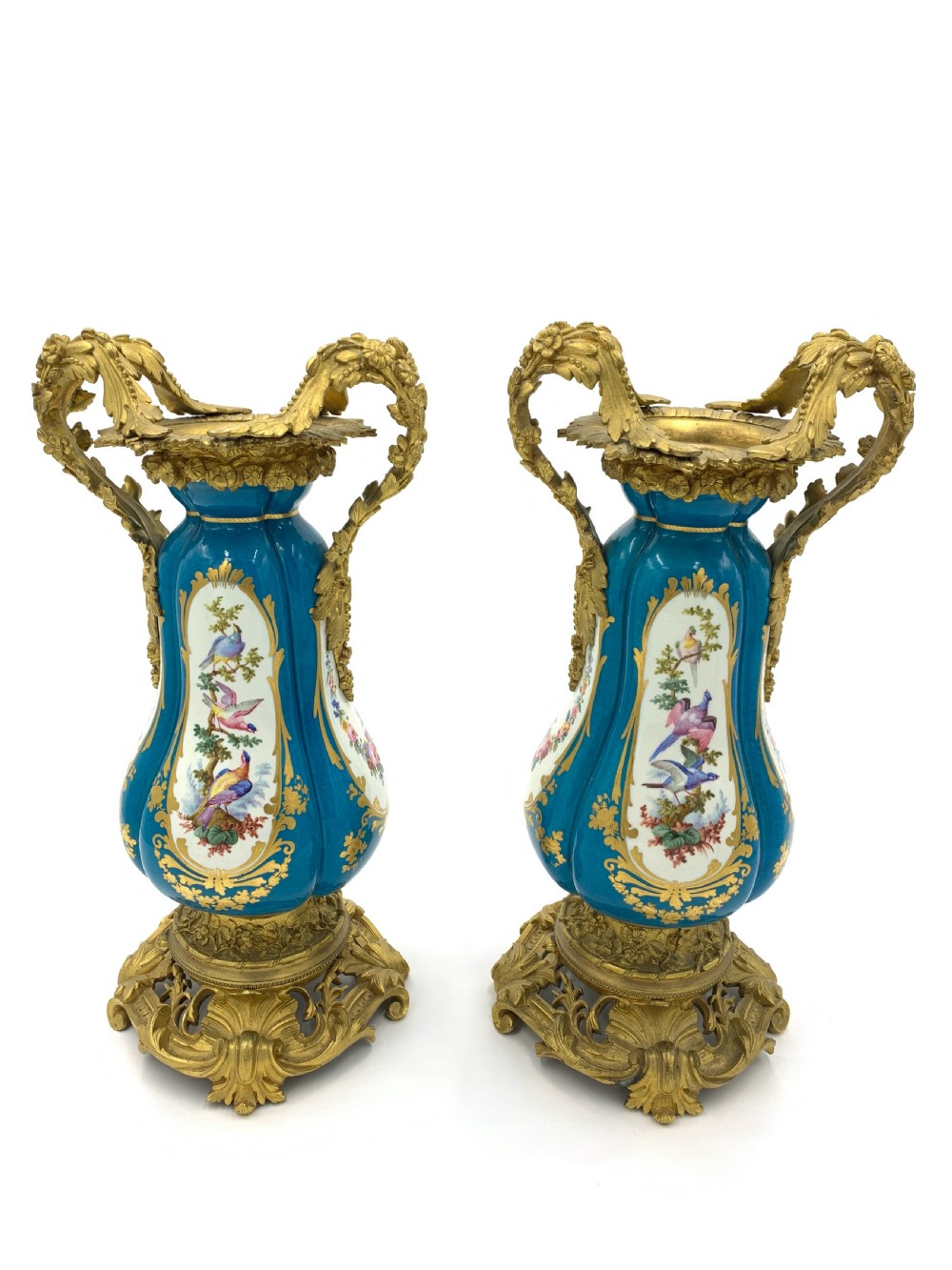 Pair of sky blue ormolu and sevres style porcelain vases 