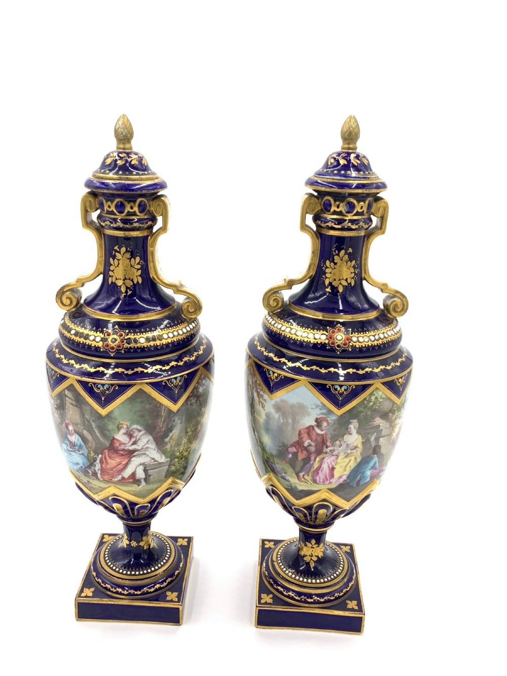 19th century pair of bejewelled sevres style vases 