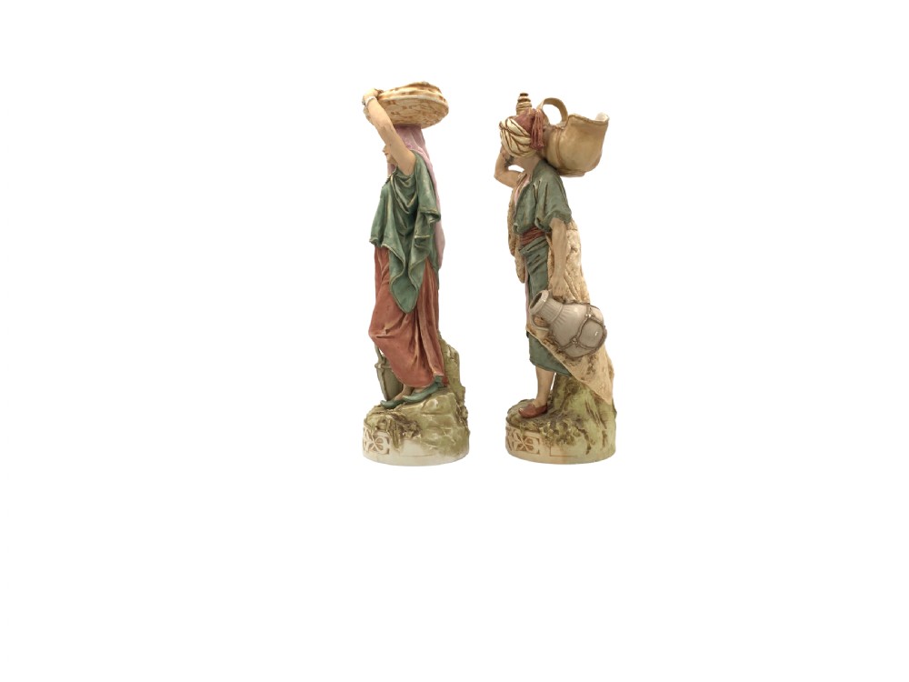 PAIR OF ROYAL DUX BOHEMIA PORCELAIN FIGURES OF AN EASTERN WATER BEARER AND HIS COMPANION  View II