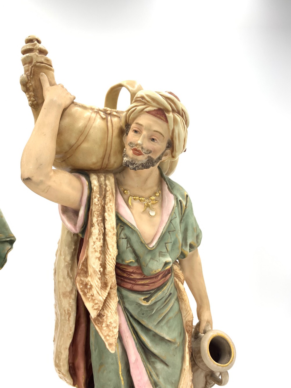 PAIR OF ROYAL DUX BOHEMIA PORCELAIN FIGURES OF AN EASTERN WATER BEARER AND HIS COMPANION  View VII