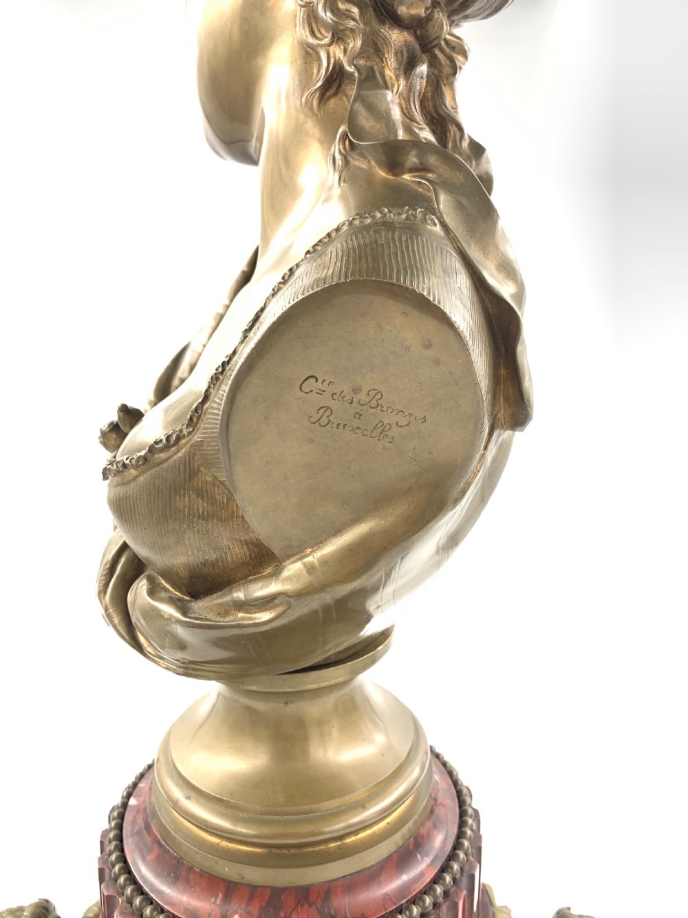 A BRONZE BUSTE OF A LADY BY LEOPOLD HARZÉ View V