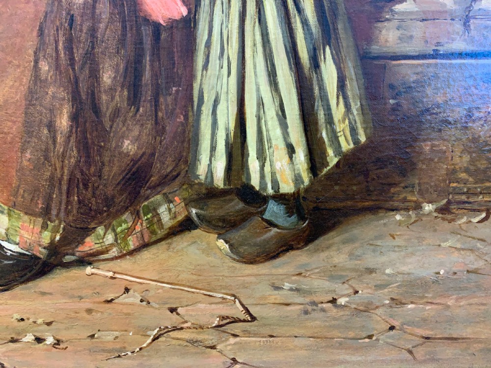 An antique oil painting depicting a mother and two children in a rustic interior, enclosed within an ornate gilded frame. View IX