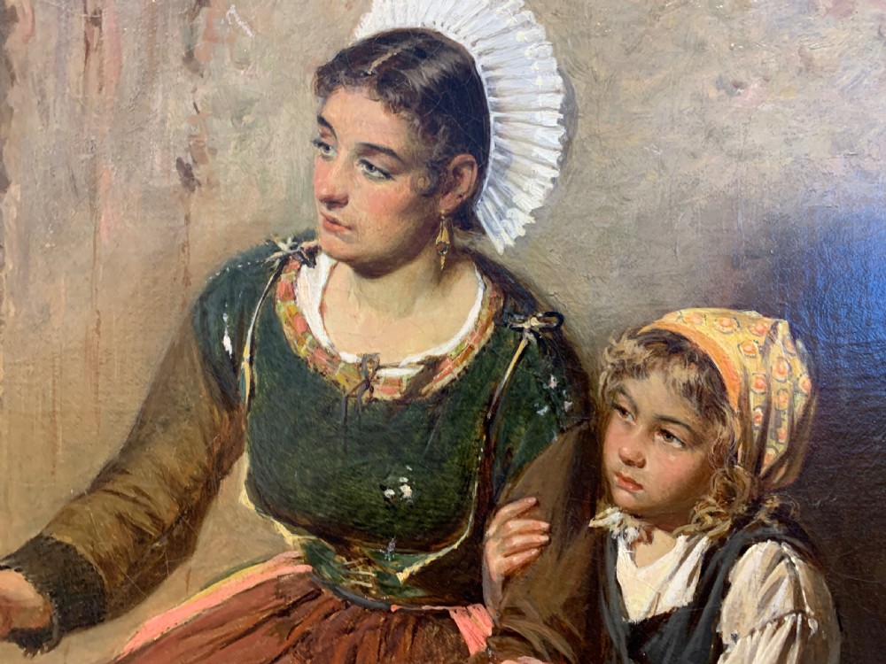 An antique oil painting depicting a mother and two children in a rustic interior, enclosed within an ornate gilded frame. View XI