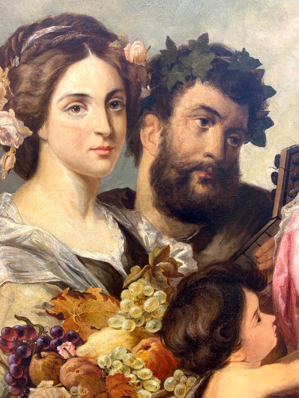 A 19th-century oil painting on canvas depicting a classical grape harvest celebration with multiple figures, presented in an elaborate gilded wood frame. View VII