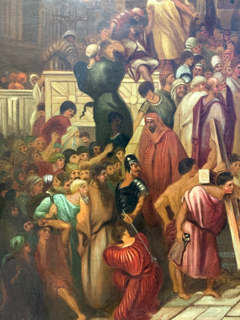 A large framed oil painting depicting a biblical narrative scene with Christ carrying the cross amidst a crowd, presented in an ornate giltwood frame. View VIII