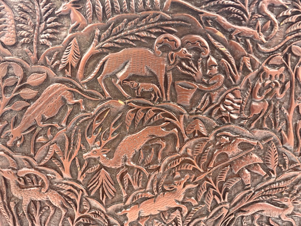 A 19th-century South Indian carved sandalwood jewellery box decorated with high-relief animal and floral motifs, supported by four carved legs. View XIII