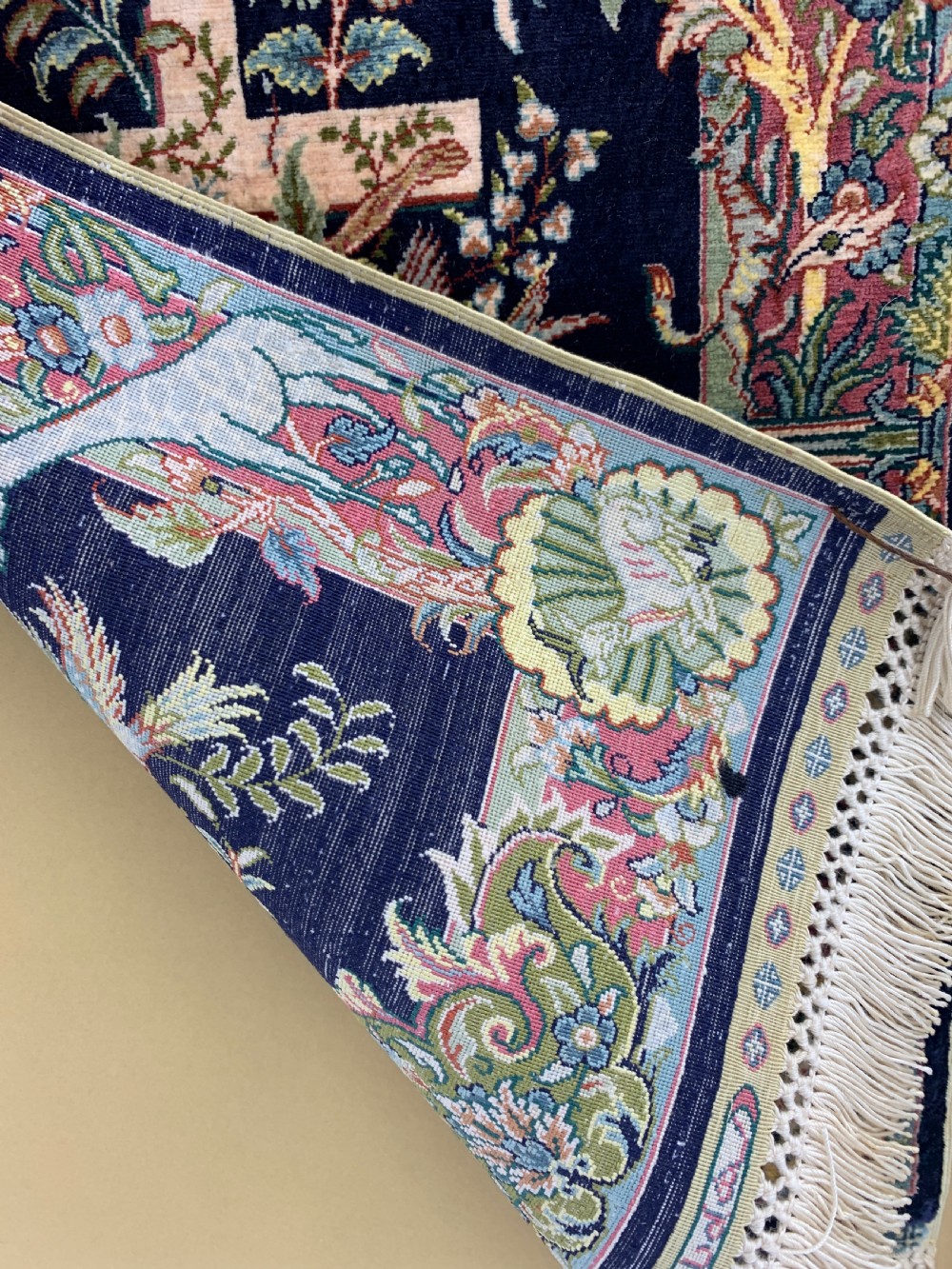 A framed Turkish miniature pure silk Hereke carpet featuring a central crucifix scene surrounded by bird motifs and floral borders. View VIII