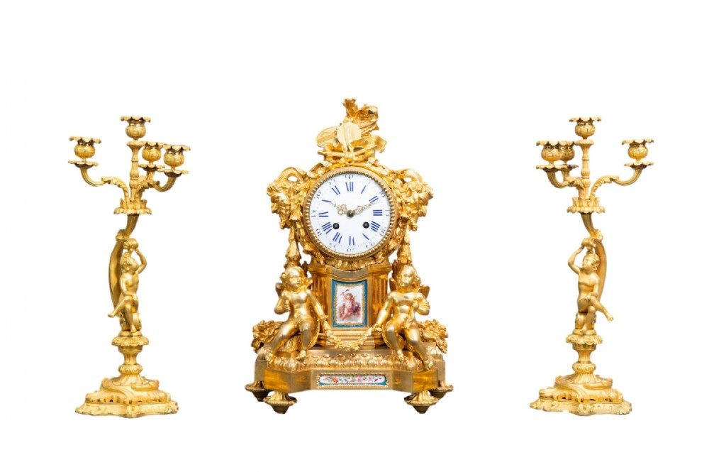 A GILT BRONZE SÈVRES STYLE CLOCK SET, LOUIS XV STYLE, FRANCE, 19TH CENTURY 