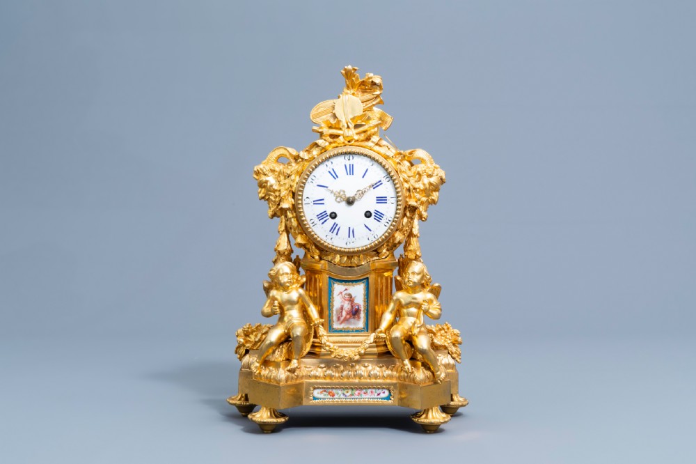 A GILT BRONZE SÈVRES STYLE CLOCK SET, LOUIS XV STYLE, FRANCE, 19TH CENTURY  View III