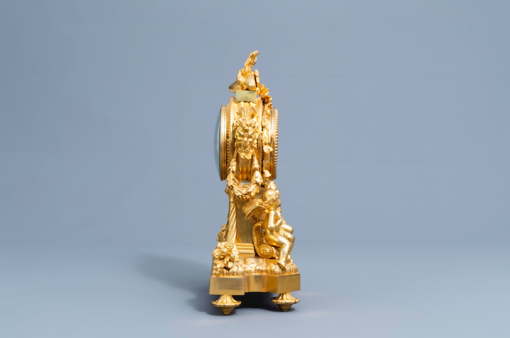 A GILT BRONZE SÈVRES STYLE CLOCK SET, LOUIS XV STYLE, FRANCE, 19TH CENTURY  View V