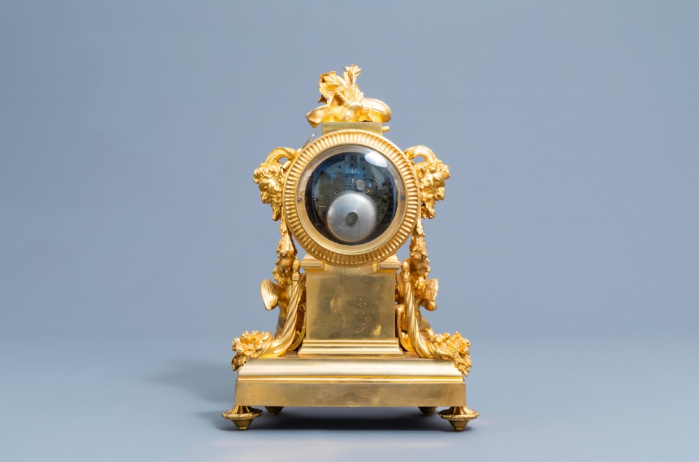 A GILT BRONZE SÈVRES STYLE CLOCK SET, LOUIS XV STYLE, FRANCE, 19TH CENTURY  View VII
