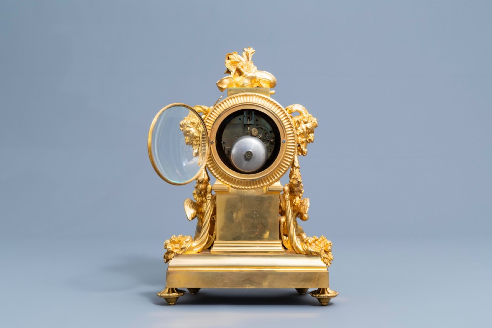 A GILT BRONZE SÈVRES STYLE CLOCK SET, LOUIS XV STYLE, FRANCE, 19TH CENTURY  View VIII