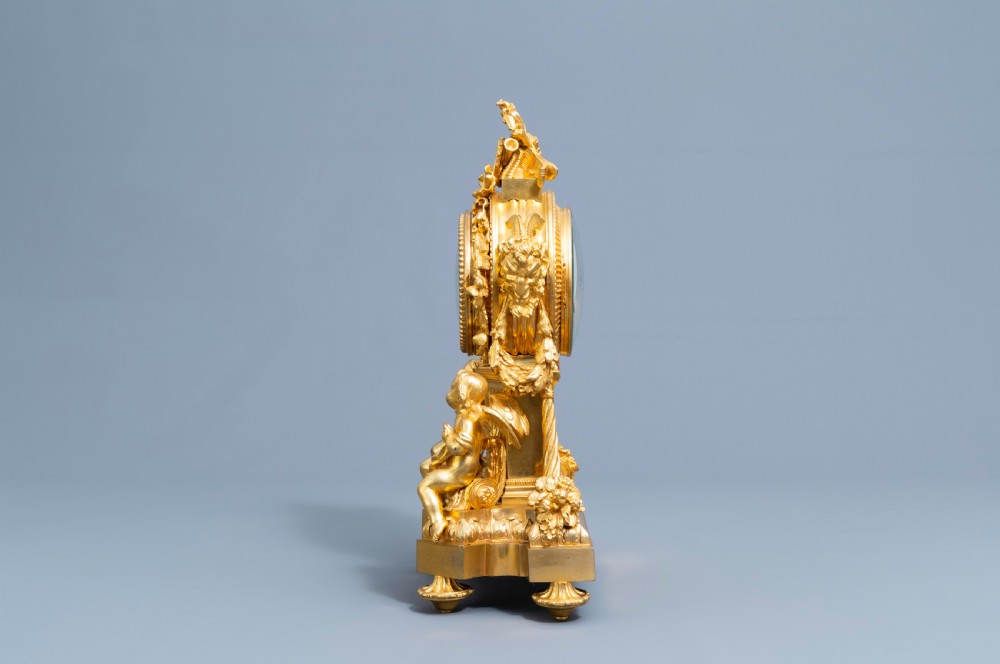 A GILT BRONZE SÈVRES STYLE CLOCK SET, LOUIS XV STYLE, FRANCE, 19TH CENTURY  View IX