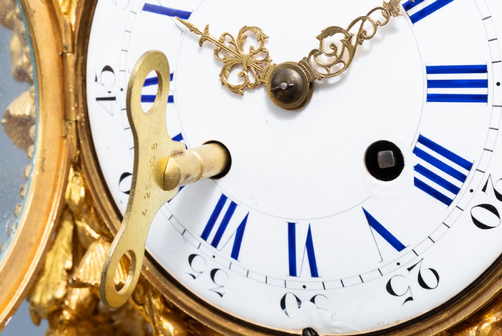 A GILT BRONZE SÈVRES STYLE CLOCK SET, LOUIS XV STYLE, FRANCE, 19TH CENTURY  View XI