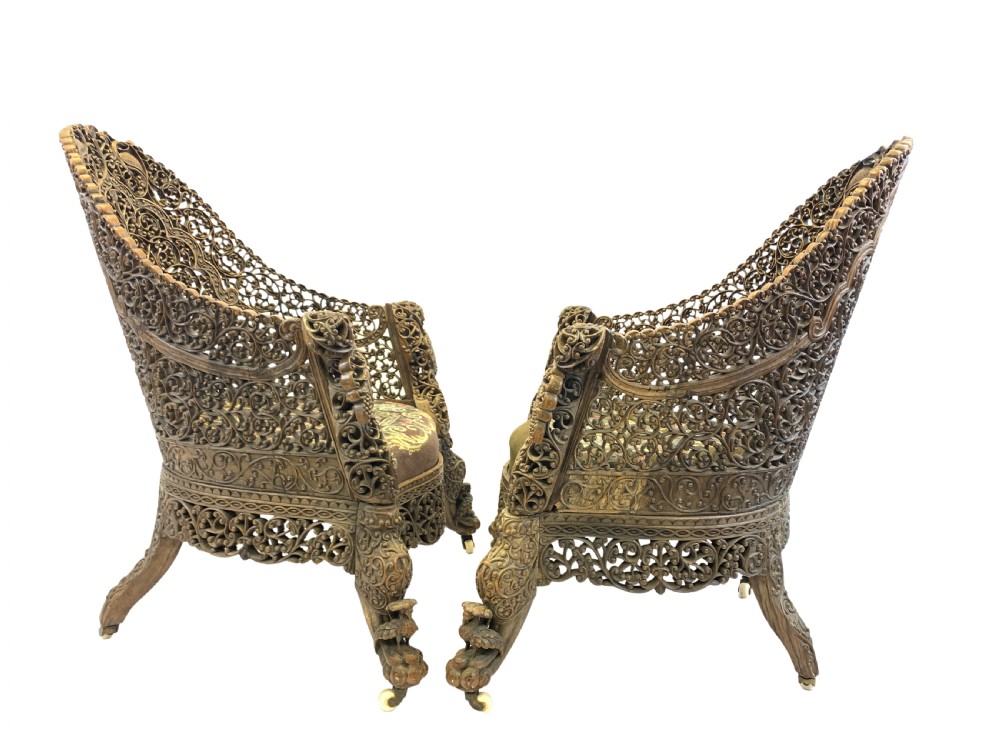 PAIR OF CARVED HARDWOOD ANGLO INDIAN ARM CHAIRS FROM THE BOMBAY PRESIDENCY, 19TH CENTURY  View II