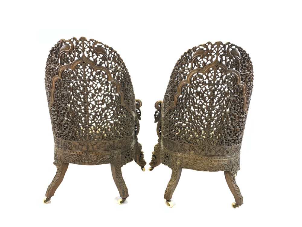 PAIR OF CARVED HARDWOOD ANGLO INDIAN ARM CHAIRS FROM THE BOMBAY PRESIDENCY, 19TH CENTURY  View III